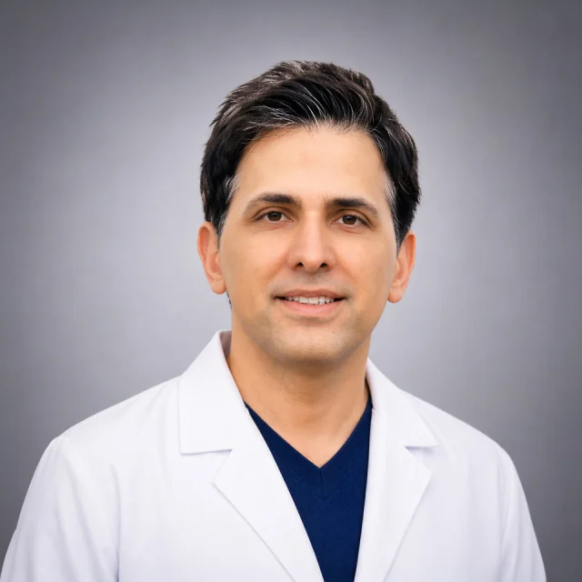 Dr. Amir Mofid — dental implants and full-arch rehabilitation clinician portrait — MAP Dental Center Houston
